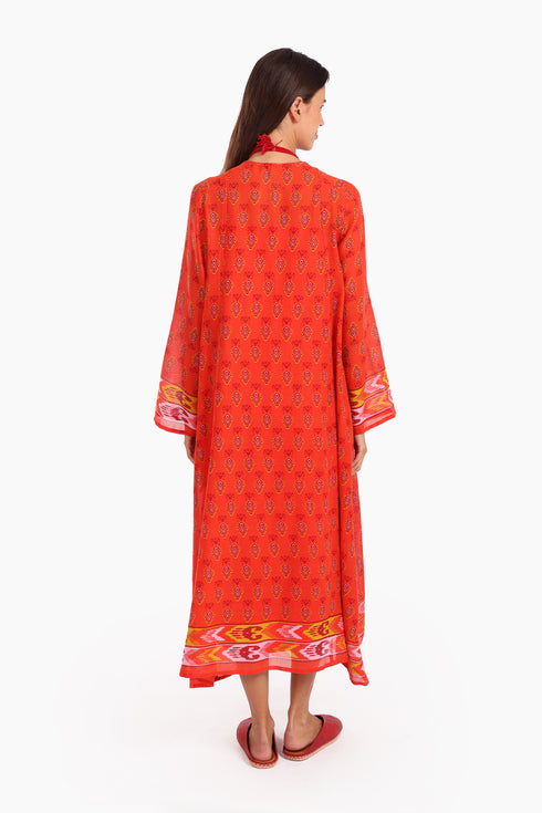 Long dress in printed cotton gauze with side pockets